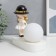 Souvenir Polystone Light "Baby in a black hat, with a gold bubble at the ball" 16.5x8x16 cm