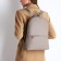 Women's backpack made of artificial leather with lightning, 2 pockets, beige color