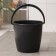 A household bucket with a measured scale "Dachnaya", 10 l, the color is black
