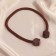 Picked up for curtains "pebbles", d = 3 × 51 cm, dark brown color