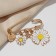 Pin "Flower" 4 pendants, 5 cm, white-yellow color in gold