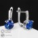 Earrings with bloom rhinestones, mini circles, blue color in silver