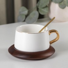 Tea couple ceramic with a spoon 