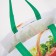 Household bag without fastening, green color/multi -colored