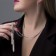 Set 2 objects: earrings, pendant "Elegance" brushes, white color in silver, 50 cm