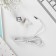 Headphones on the postcard, “brisk music”, vacuum, white