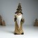Suvenir Polystone "Santa Claus in a golden outfit, a cap, with a wreath" 10x8x29 cm
