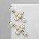Earrings Assorted "Flowers" in crosses, white color in gold
