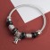 Bracelet Assorted Mardgeri Bant, black color in silver, d = 6.5 cm
