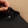 The fastener is sewn for a bag, on a button, made of genuine leather, 13.5 × 2.5 cm, black/silver color