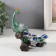 Polystone souvenir "Green peacock on a snag with a flower" 13.7x13.2x7.5 cm