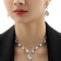 Set 2 objects: earrings, necklace necklace drops, one thread, white color in silver, 35 cm