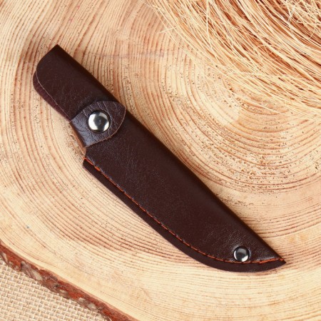 The scabbard is a leather knife cover, under a blade up to 10 x 3 cm, dark brown