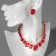 Set 4 objects: earrings, necklaces, bracelet, “evening” ring volume, red in gold