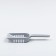 A scoop for cleaning a cat toilet, gray
