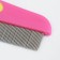 A comb for wool 15.6 x 3.6 cm, short teeth 1.7 cm, pink-yellow