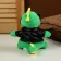 Soft toy "Dragon", in a black jacket and glasses, 15 cm, green color