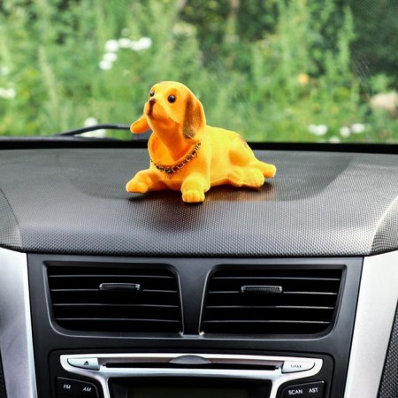 Dog on a car panel shocking his head, a large, red color-4