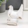 Souvenir ceramics "White dove on books/gift" with gold, rhinestones 7.5 cm mix