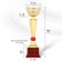 The 174V Cup, award figure, gold, plastic stand, 29.3 x 10 x 7.5 cm.