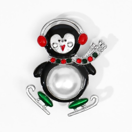 Brooch "Dancing Penguin", colored in silver