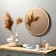Wall mirror in a round case made of metal, d = 50, gold