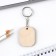 A wooden key key, a “beloved husband” token 3.5 x 4.5 cm