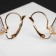 Earrings with “Big Sapphire” rhinestones in inclination, D = 1.6, white color in gold