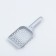 A scoop for cleaning a cat toilet, gray