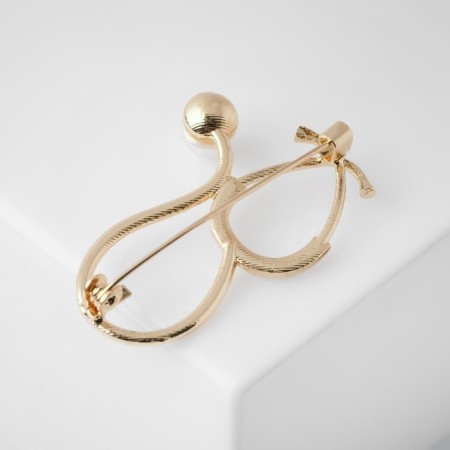 Brooch "Stetoscope", white color in gold-2