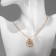 The pendant "New Year" snowflake in the ring, the color is white in gold, 45 cm