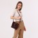 Cross-Bodi bag on a weight, brown color