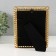 Polystone photo frame 10x15 cm "loops" gold with a mirror 20.7x15.7 cm