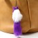 Fluffing on a pendant with colored bells mix