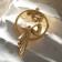 Brooch "Virgin" with a ball, white color in matte gold