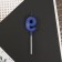 Candle for the cake, the number "9", blue.