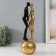 Souvenir Polystone "Abstraction. Lovers on the ball" Gold with black 9.5x9.5x32 cm