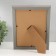 Photo frame plastic 15x20 cm "Golden waves and points" dark wood 18.5x23.5 cm
