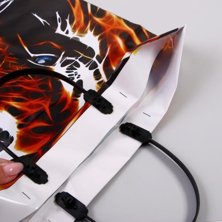 Tiger package, polyethylene with a plastic pen, 38x44 cm, 90 μm-1