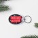 A keychain with an insert "mood", 5 x 4 cm.