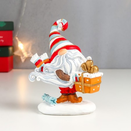 Polystone souvenir "Grandfather Frost with a gift, in a striped cap" 13x5.5x10.5 cm