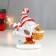 Polystone souvenir "Grandfather Frost with a gift, in a striped cap" 13x5.5x10.5 cm