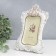 Photo frame Polystone 10x15 cm "Roses. Medallion. Tysiness" Rhinestones 23.5x17 cm