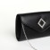 Female bag on a magnet, black color