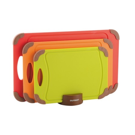 A set of 3 plastic cutting boards on a stand-1