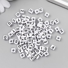 A set of beads with English letters 
