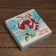 The box is folding, the cover is "happiness in the new year" 20 x 20 x 6 cm