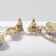 Hanging earrings with rhinestones "Heart", colored in gold