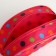 Road cosmetic bag on a zipper, with a handle, pink color
