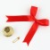 A bell on a pin with a bow for graduation, red, d = 2.6 cm